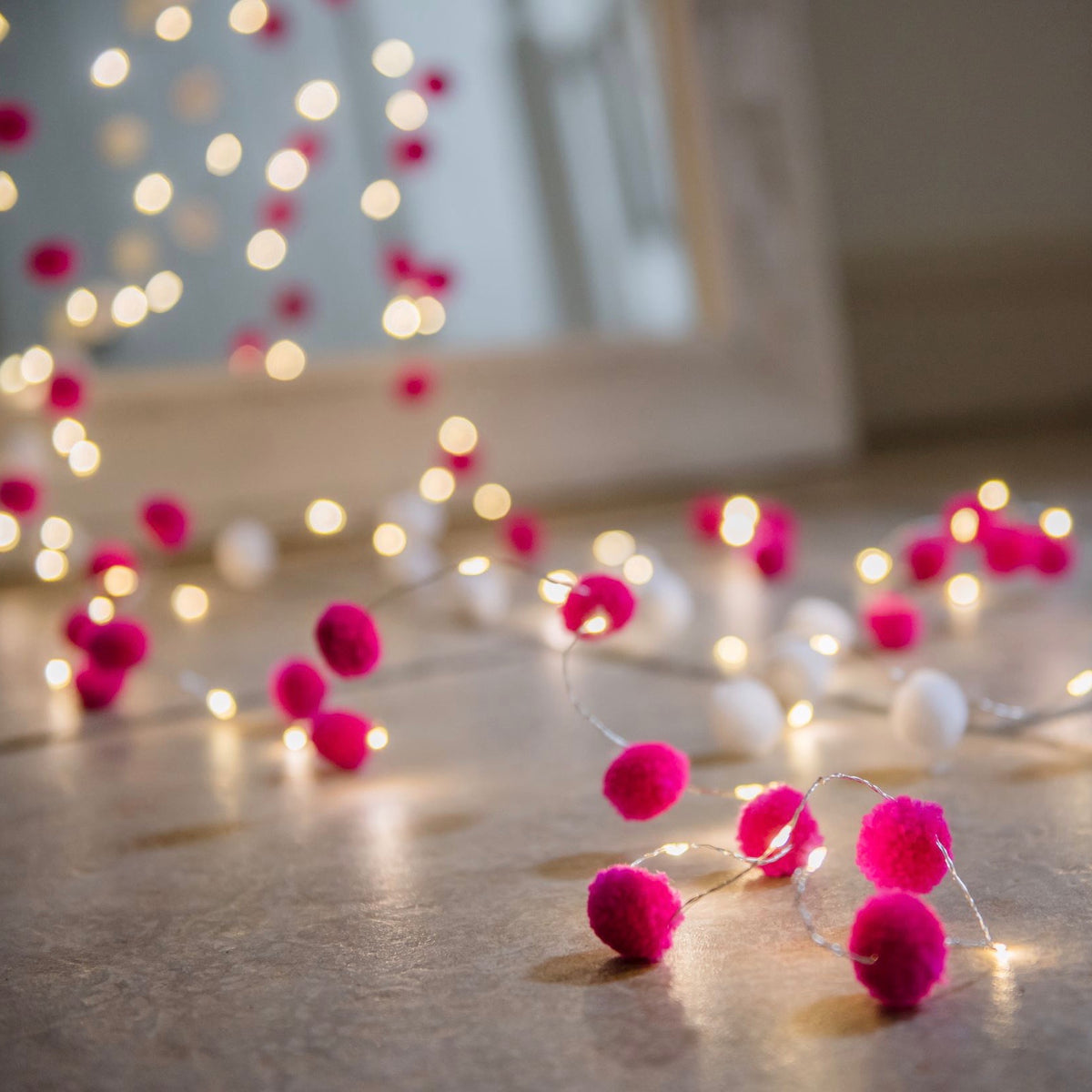 Pink pom deals pom fairy lights