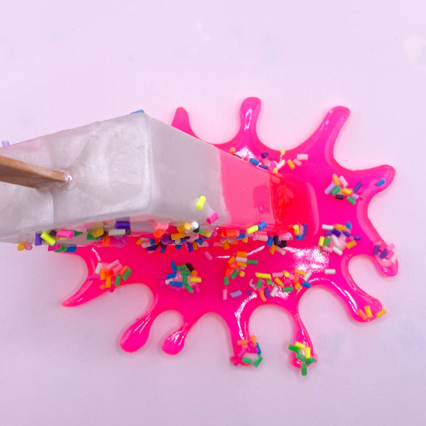 Pink Neon Lolly Splat Sculpture With Sprinkles