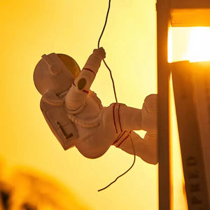 Climbing Astronaut figurine